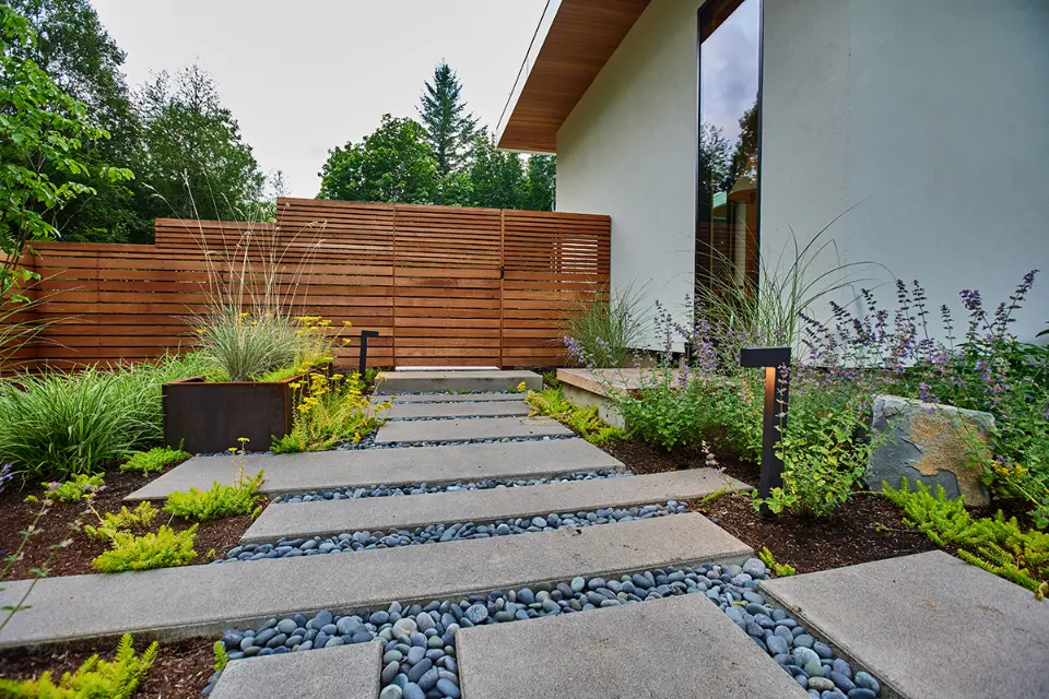 modern landscape design with stones and walkway path