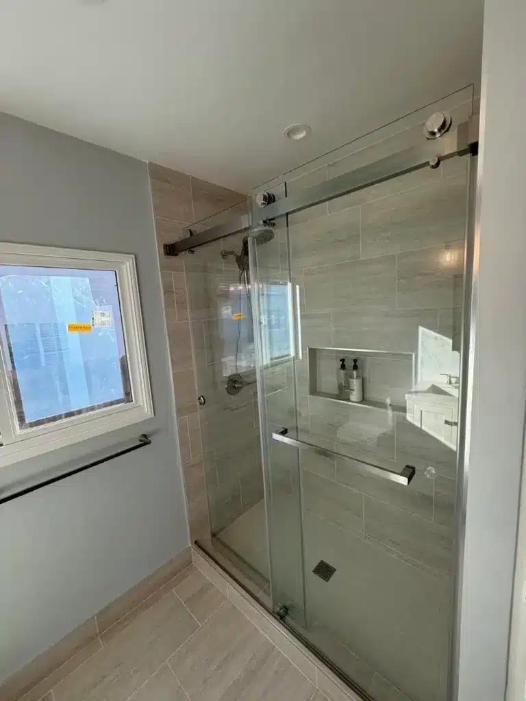 small bathroom remodel of a shower with glass