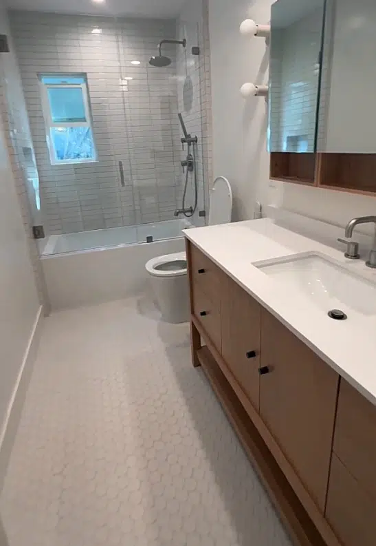 contemporary bath with wood vanity