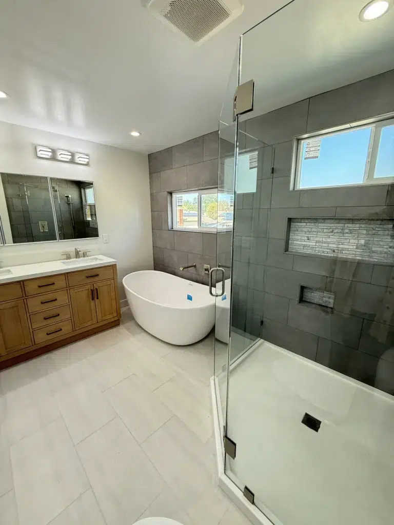 contemporary wood bathroom vanity and tub
