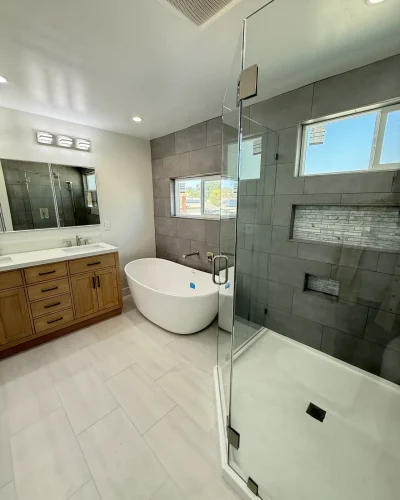 contemporary wood bathroom vanity and tub