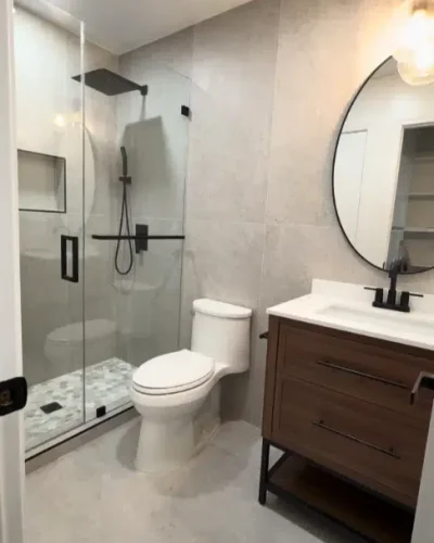 modern bathroom with dark wood vanity