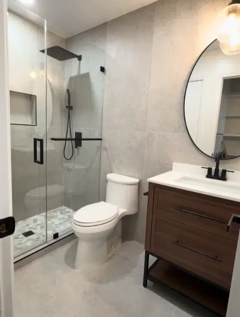 modern bathroom with dark wood vanity