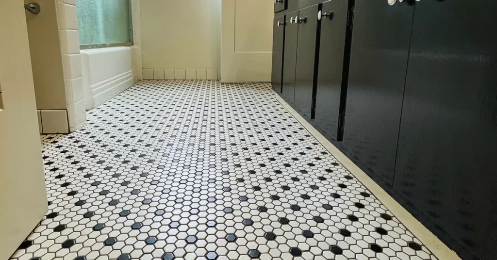 Classic black and white hexagon tile bathroom floor renovation